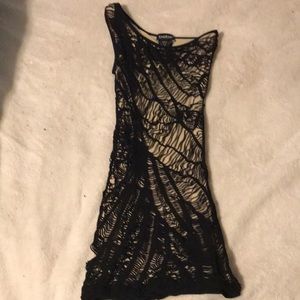 Off the shoulder, form fitting dress.